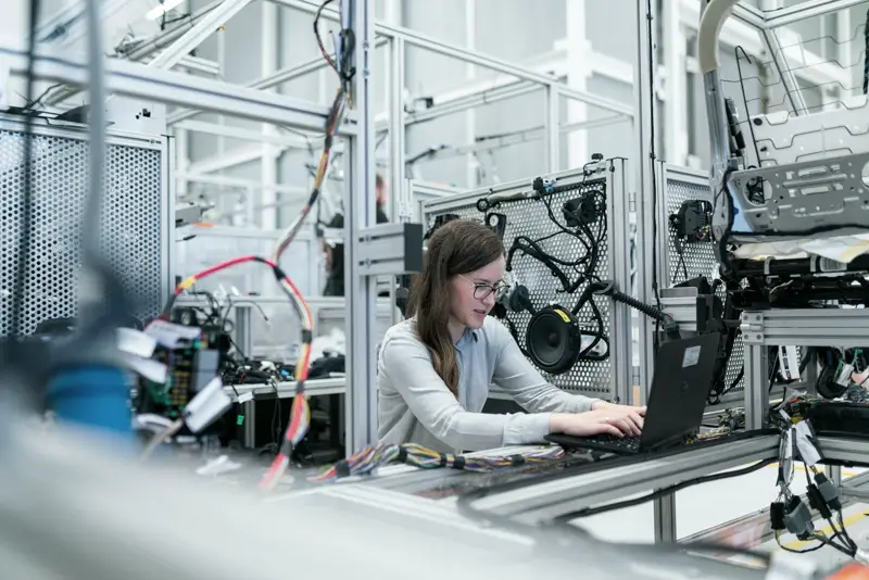 Engineer working at a production station